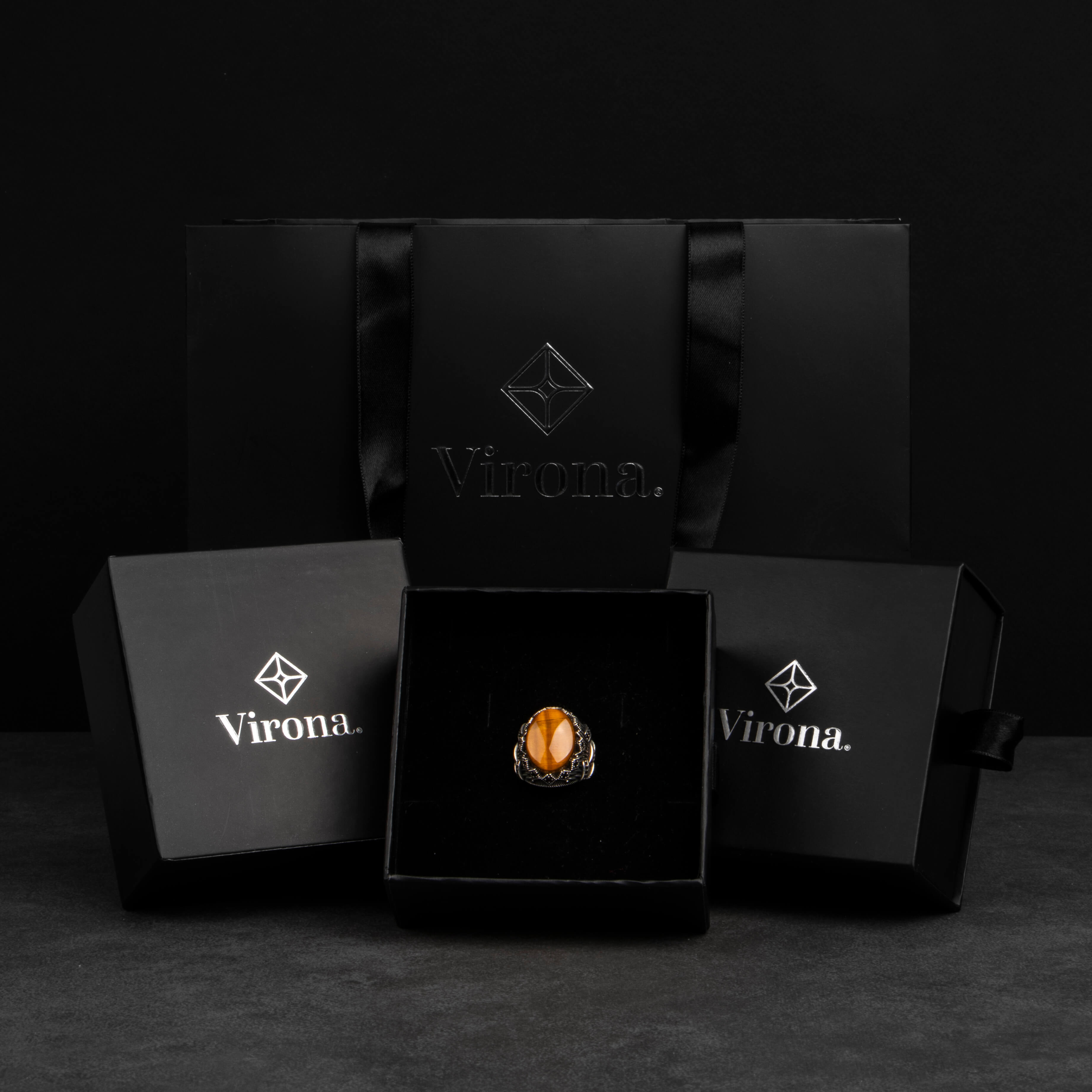 Men's silver ring with tiger's eye stone with fine details