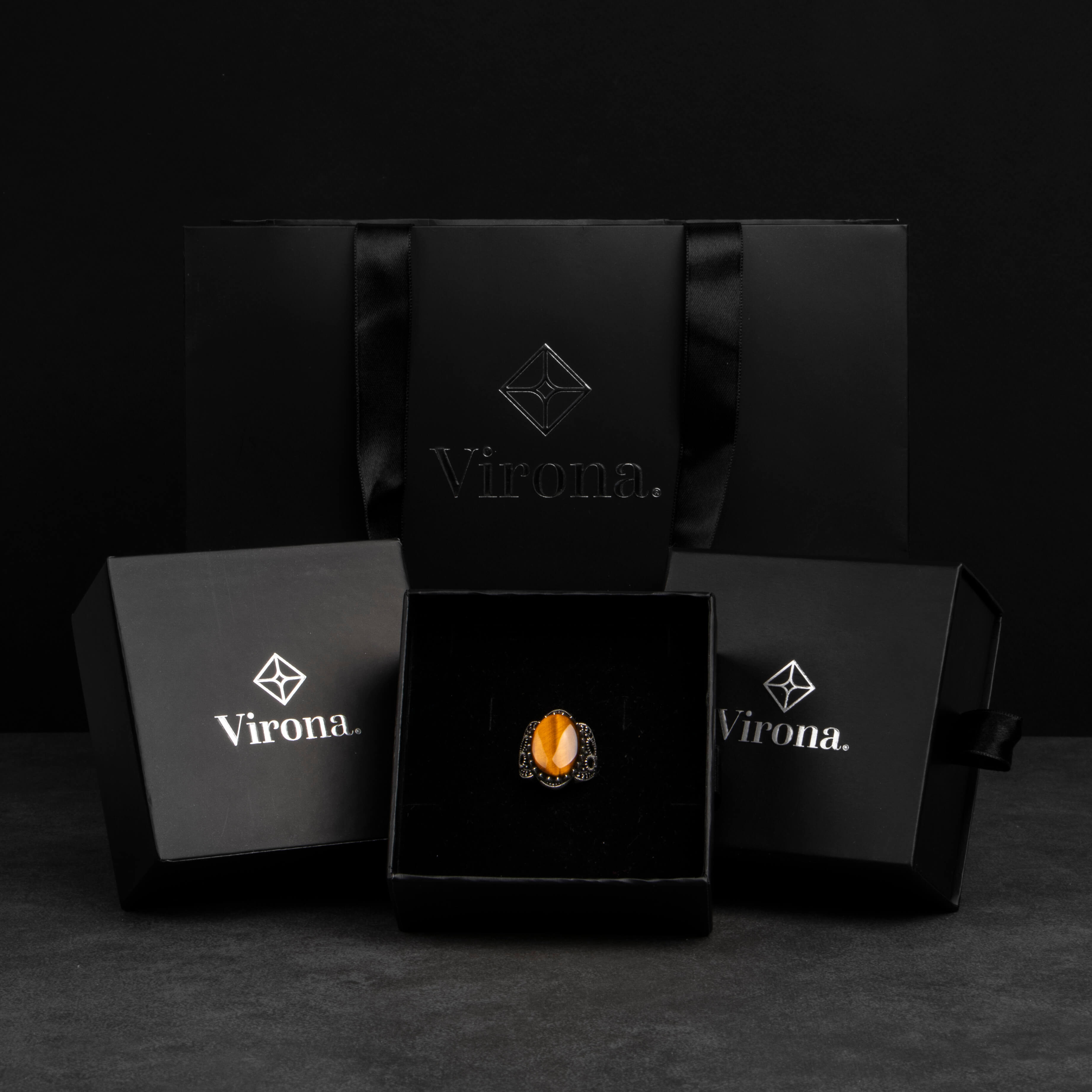 Men's silver ring with tiger eye stone with ornate design