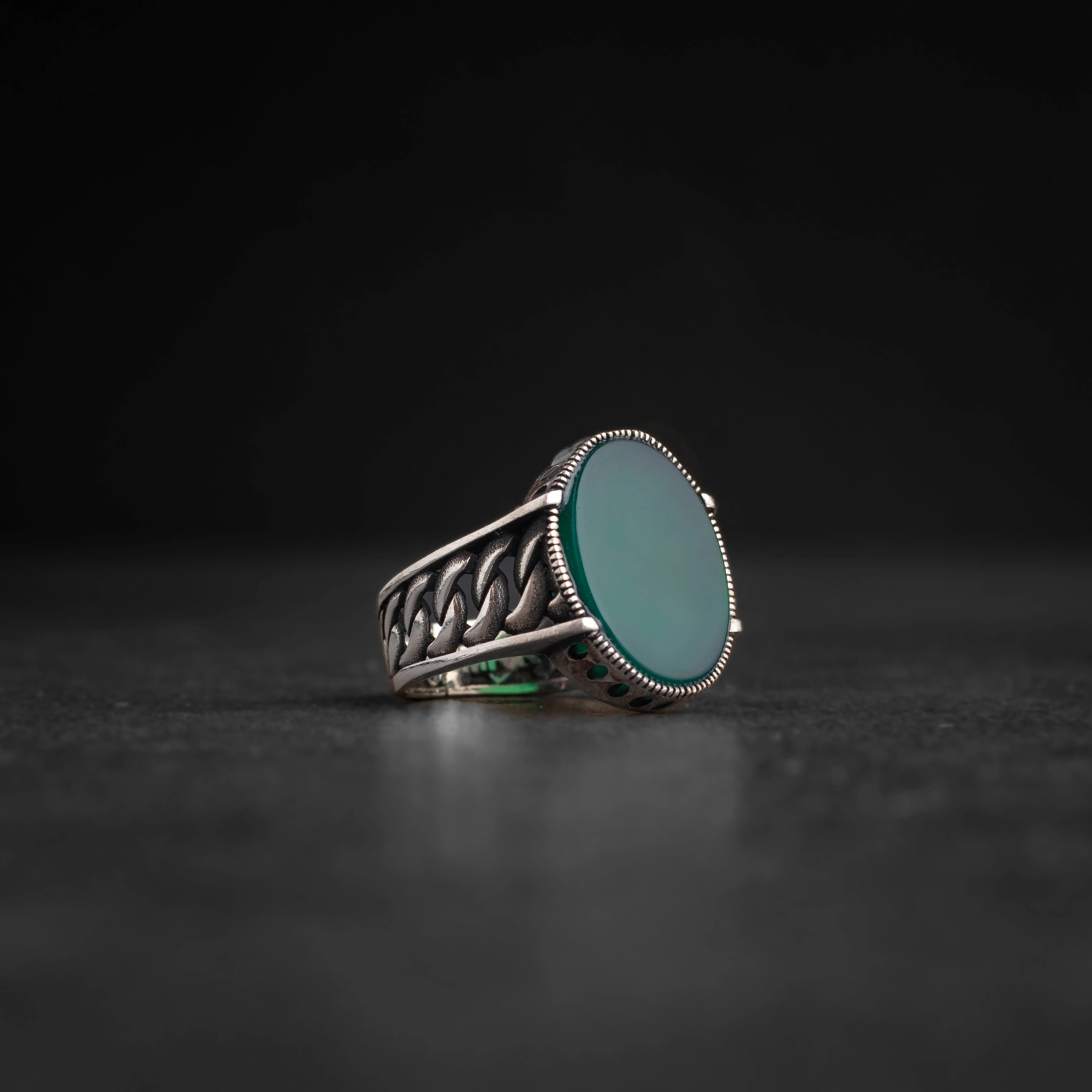 Men's silver ring decorated with green agate stone