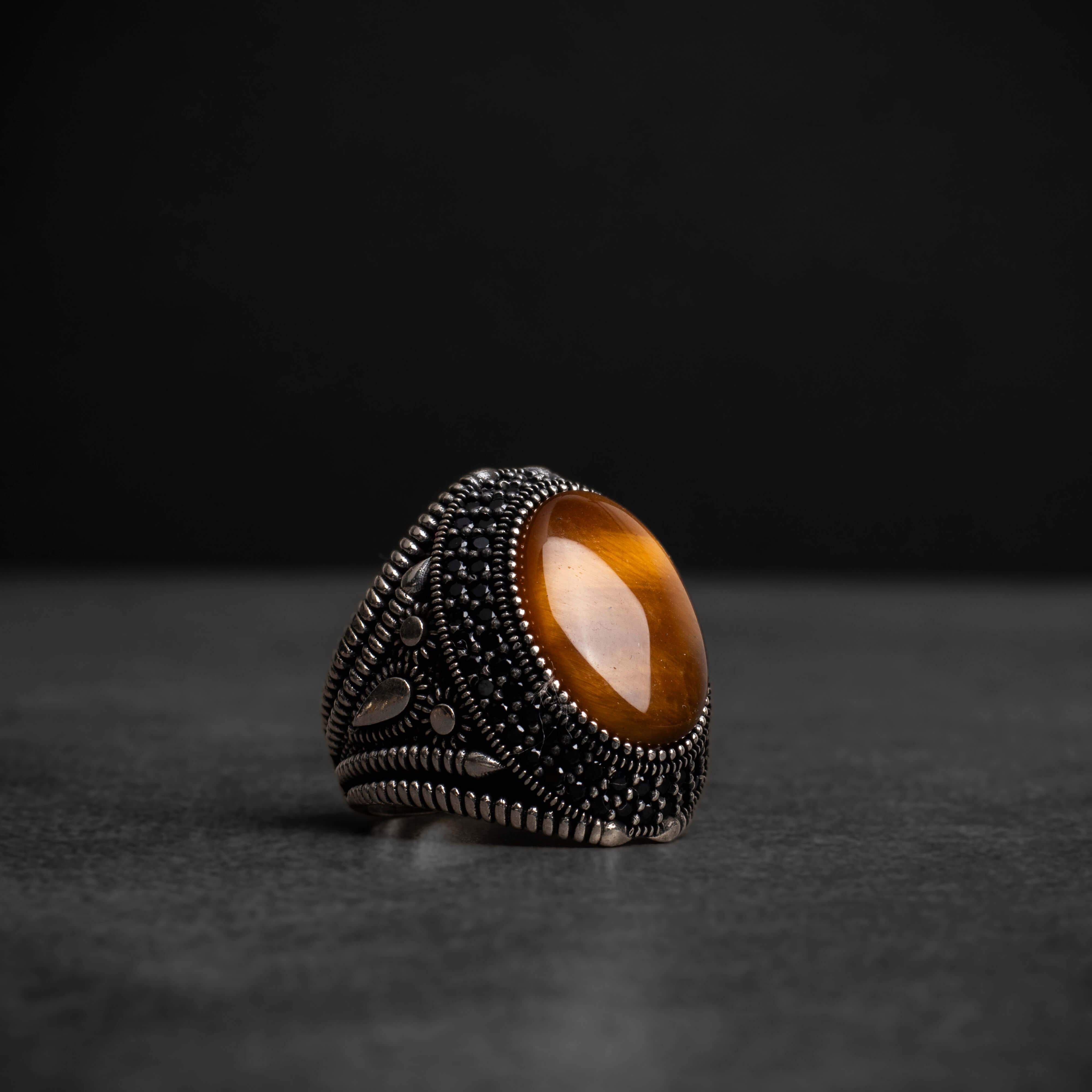 Men's silver ring with a prominent tiger's eye stone, with a luxurious and elegant design