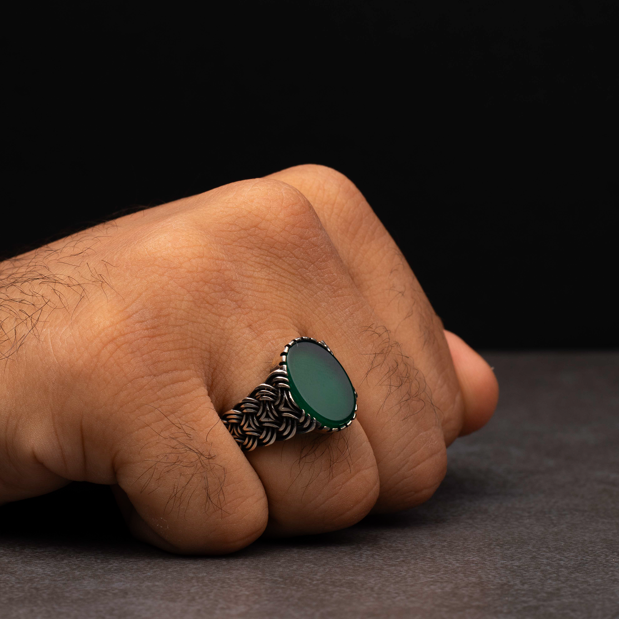 Men's silver ring decorated with green agate stone