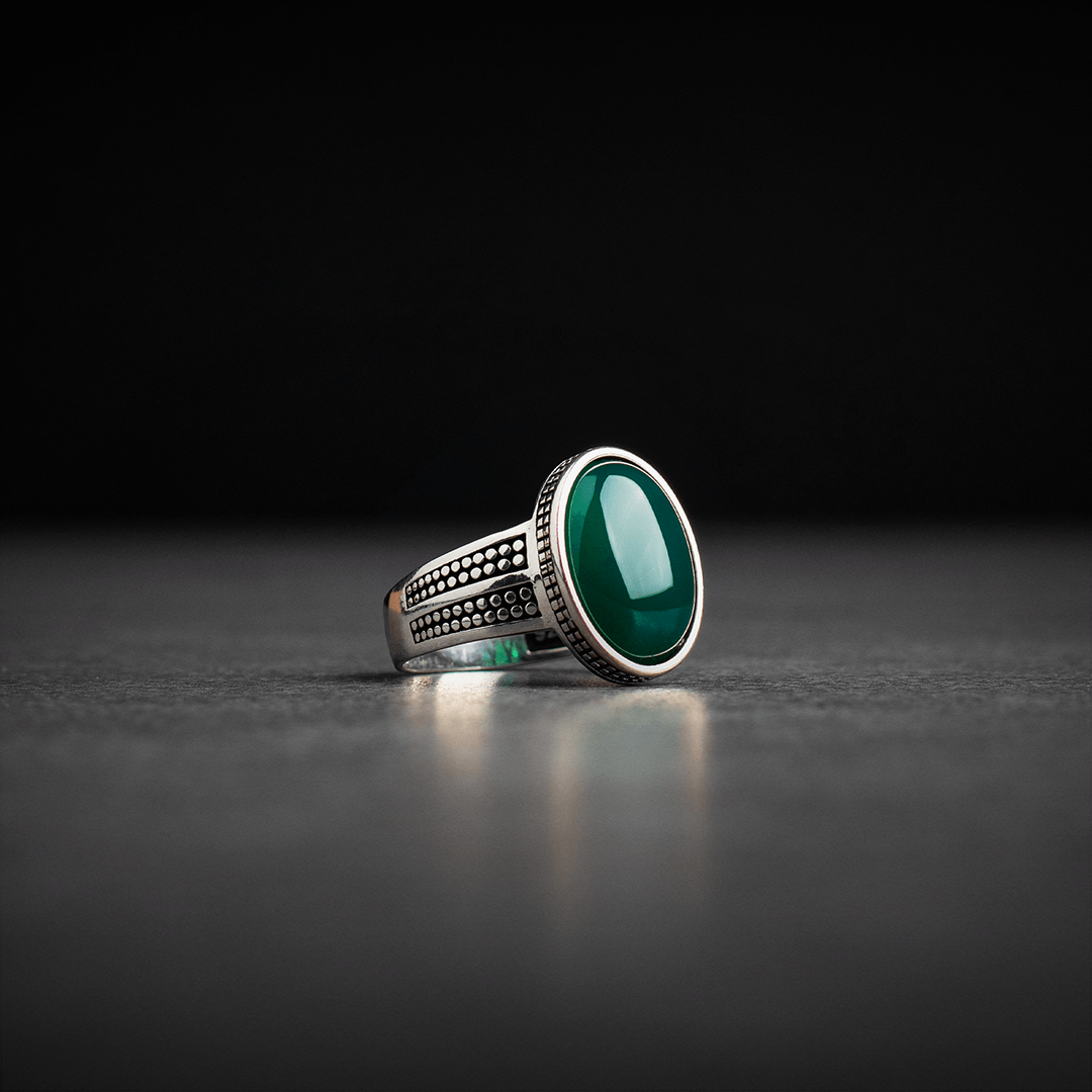 Men's silver ring decorated with green agate stone