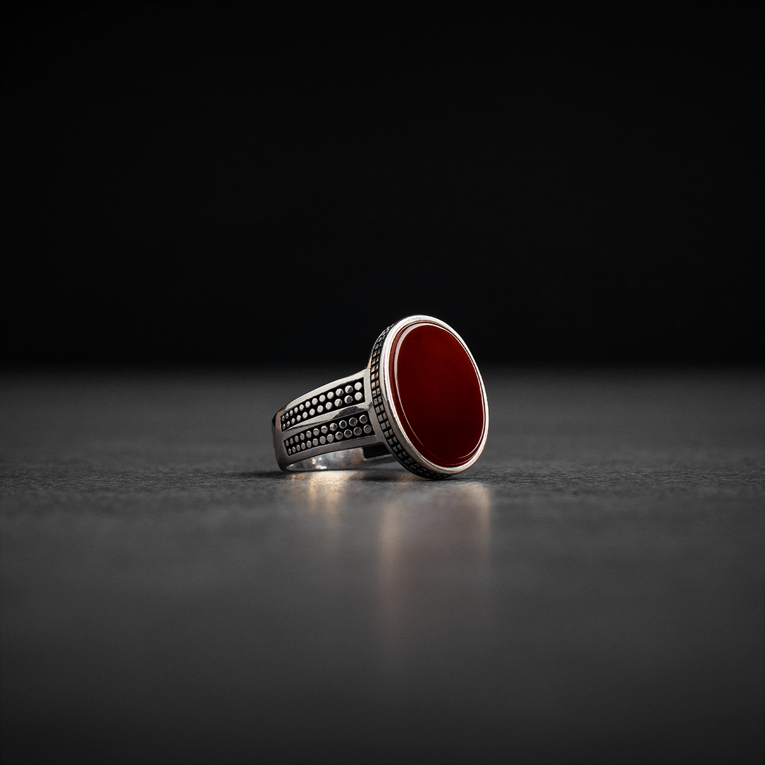 Men's silver ring decorated with red agate stone