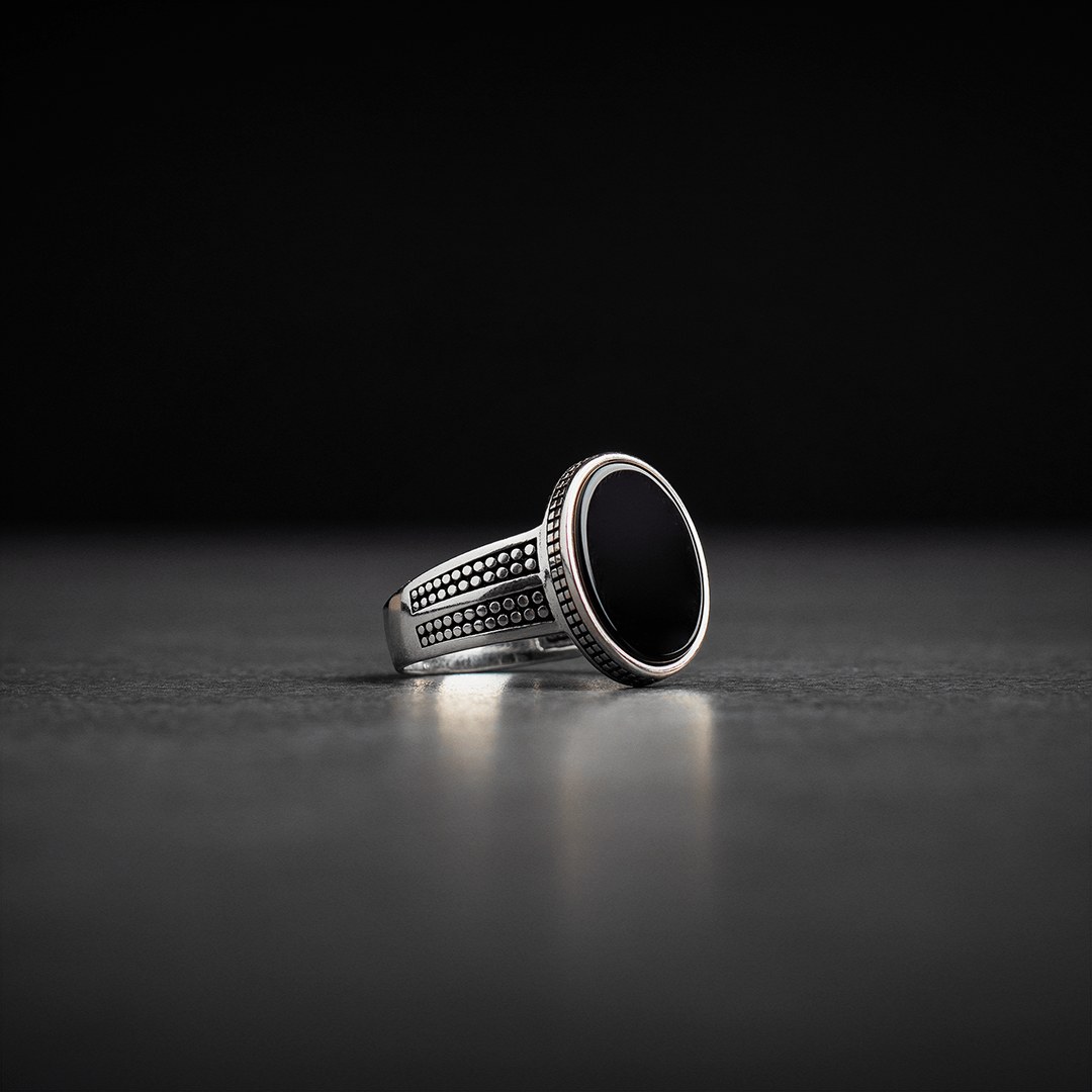 Men's silver ring decorated with black onyx stone