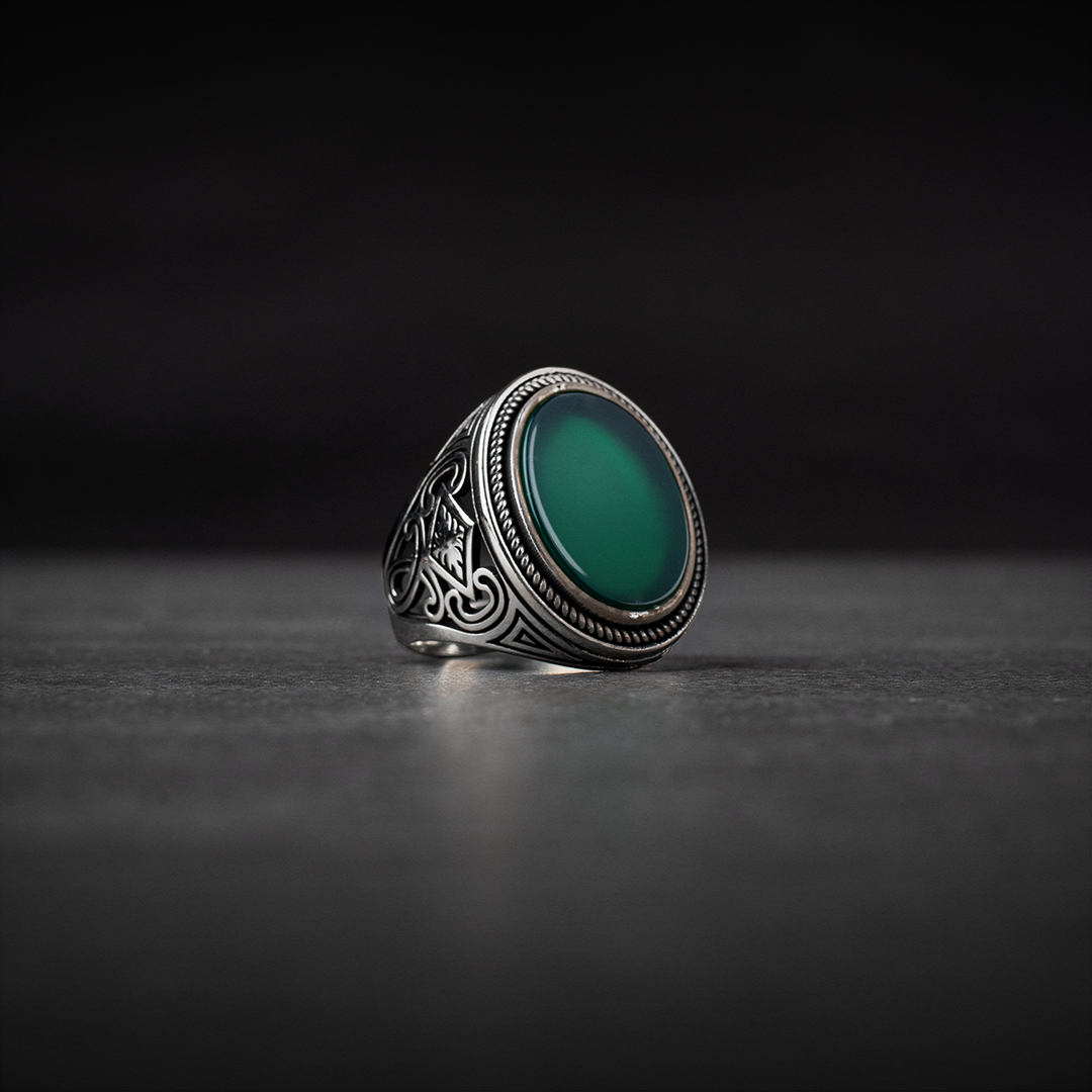 Men's silver ring decorated with green agate stone