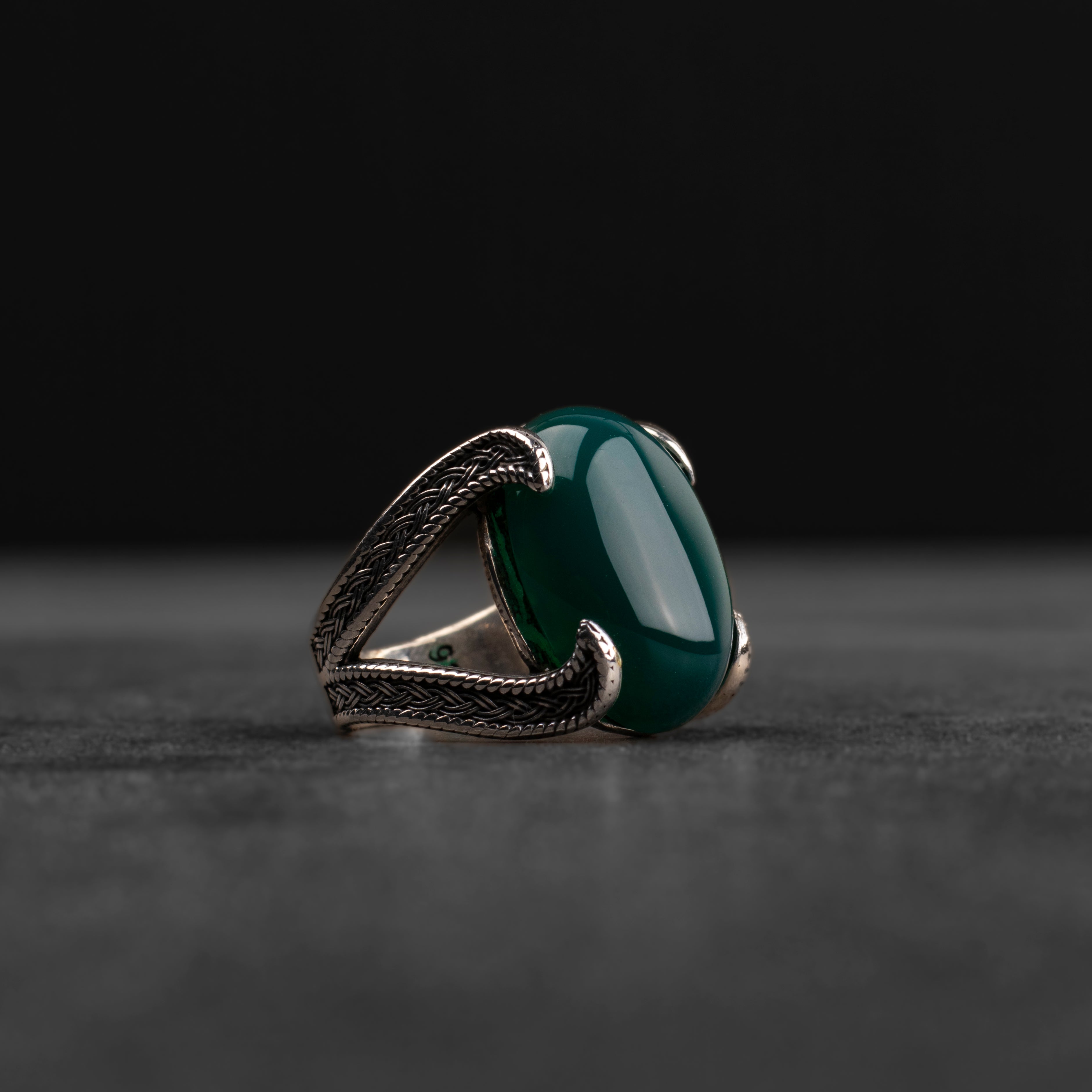 Men's silver ring decorated with green agate stone