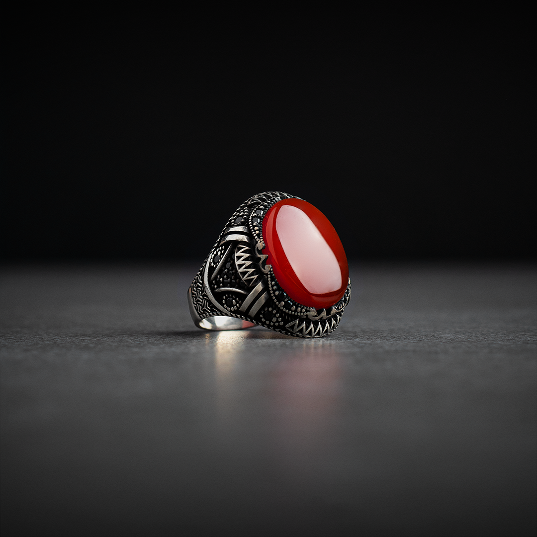 Men's silver ring decorated with a red agate stone