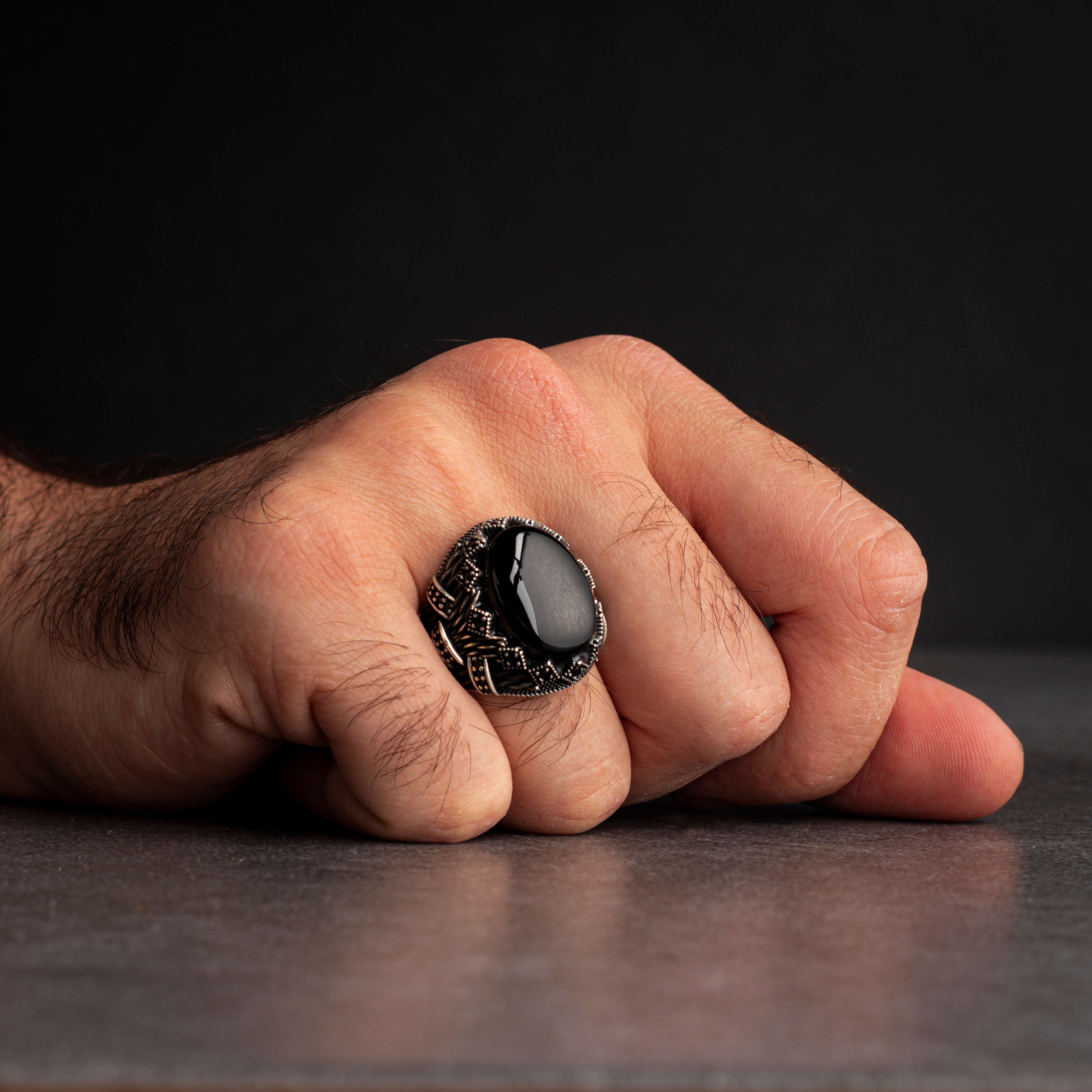 Men's silver ring decorated with black onyx stone