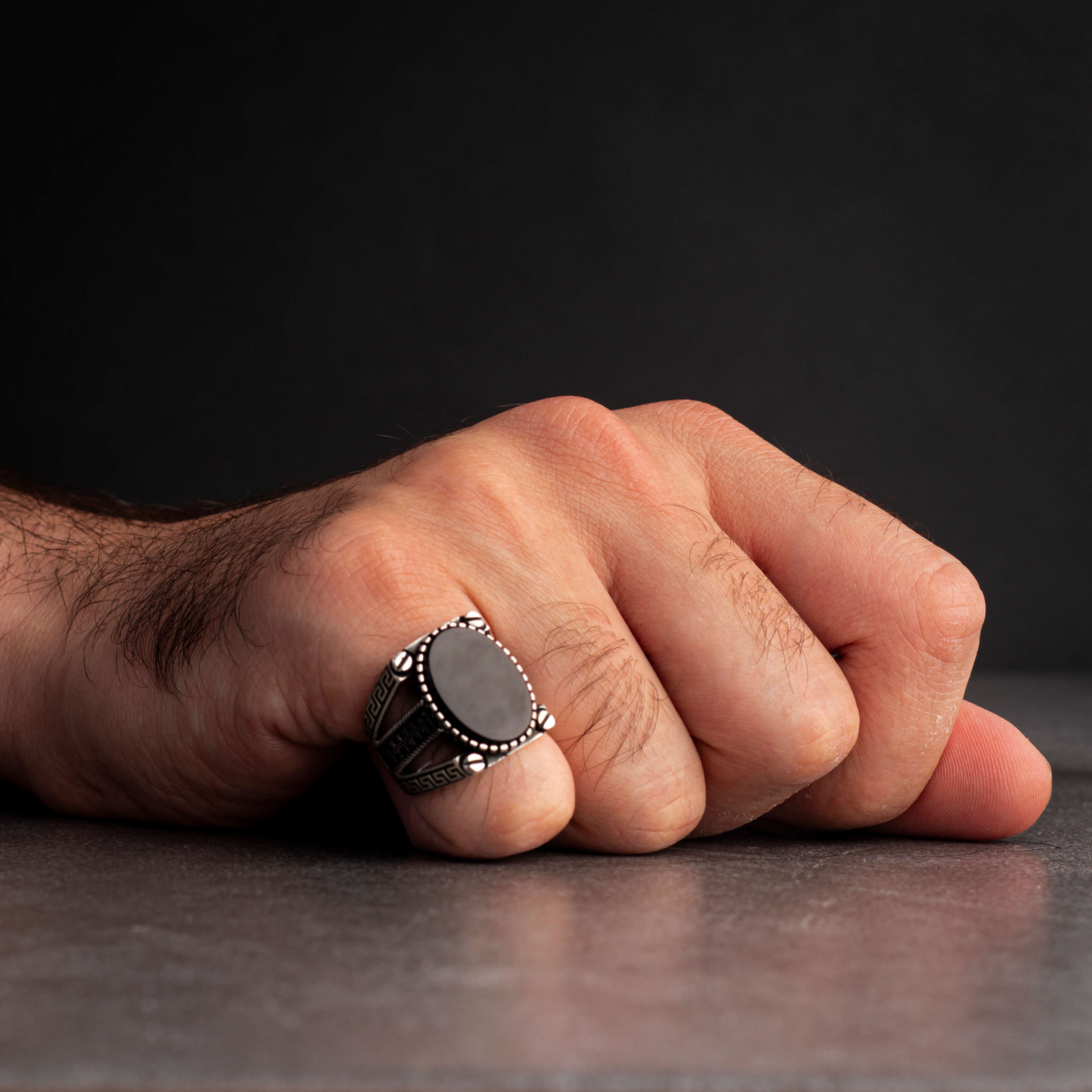 Men's silver ring decorated with black onyx stone