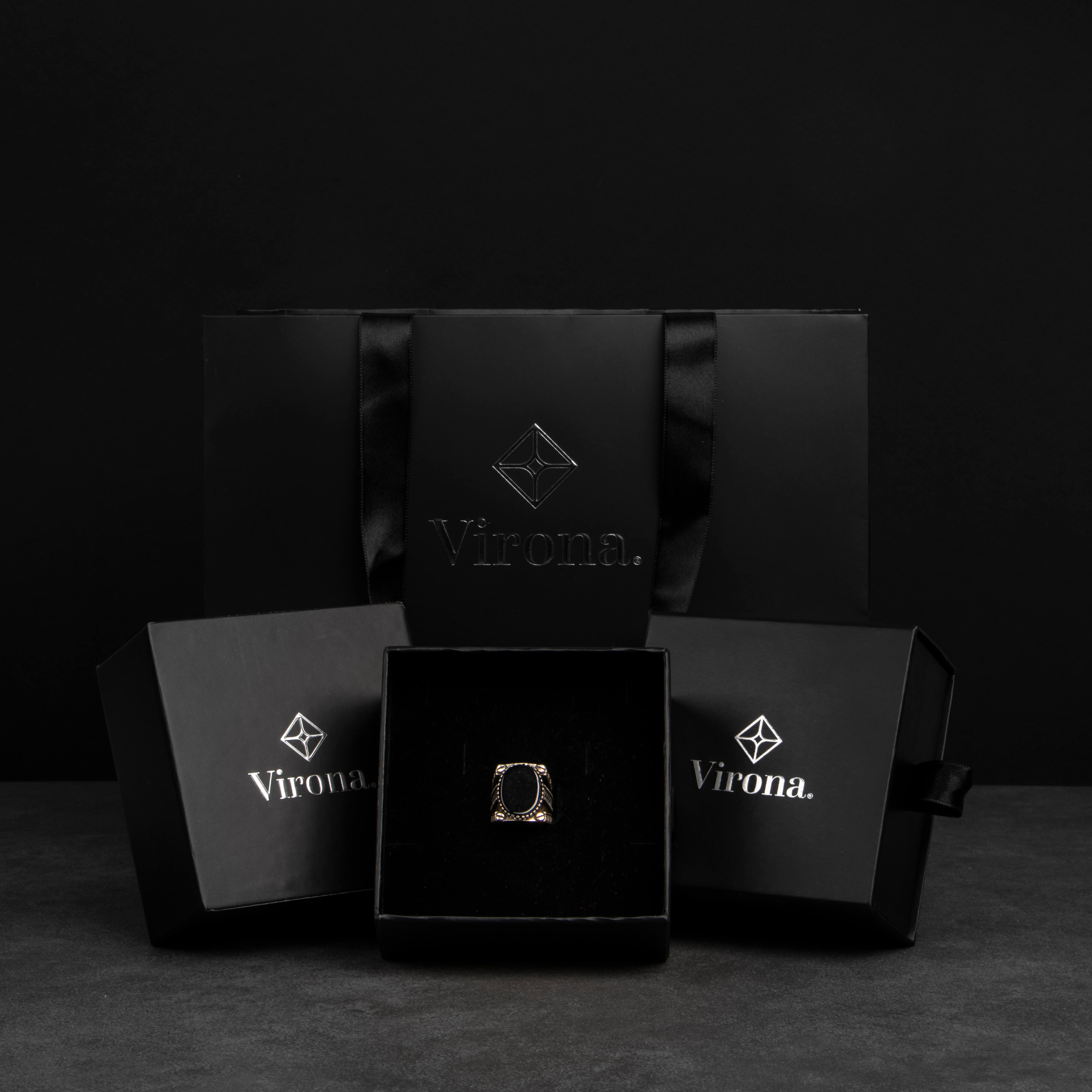 Men's silver ring decorated with black onyx stone