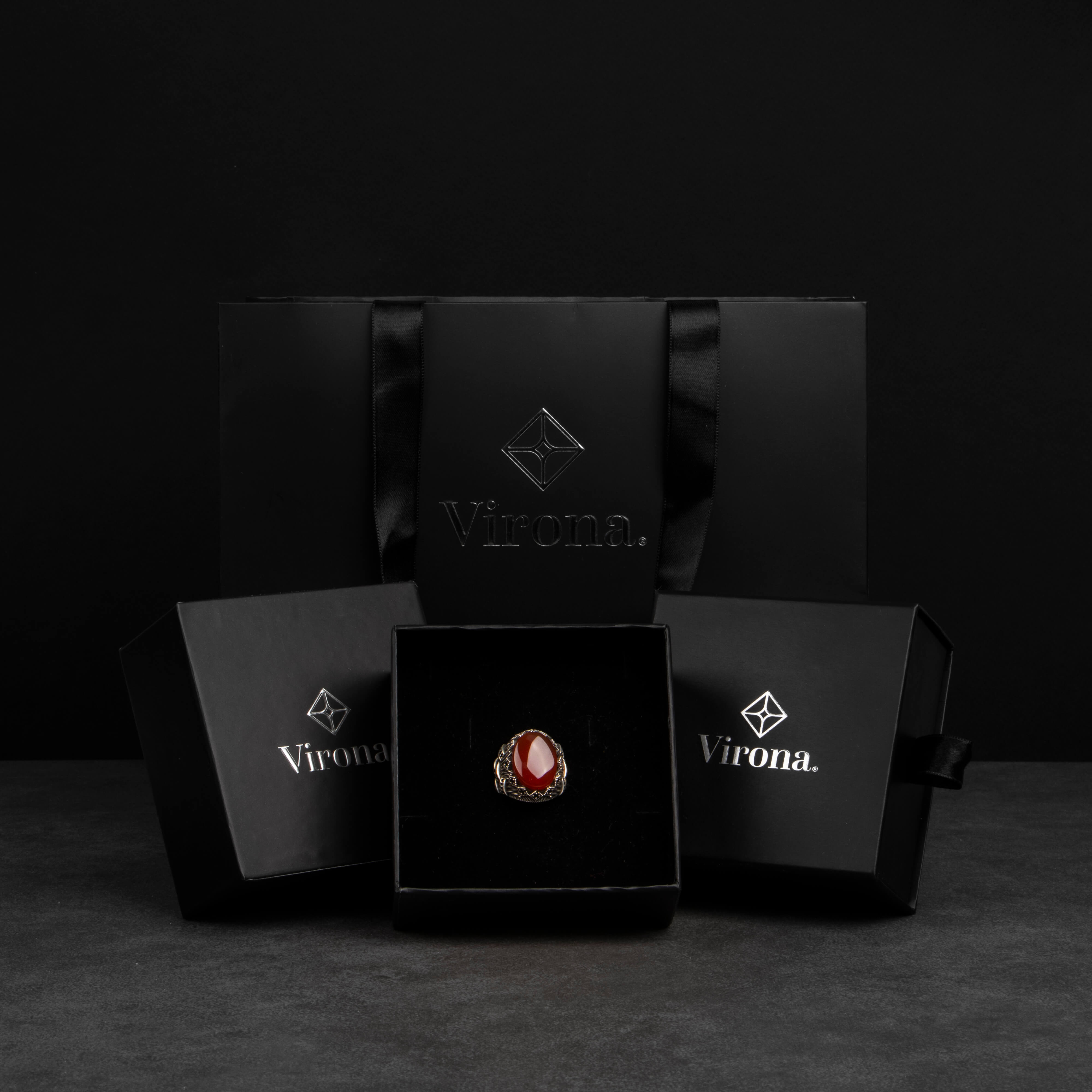 Men's silver ring decorated with red agate stone