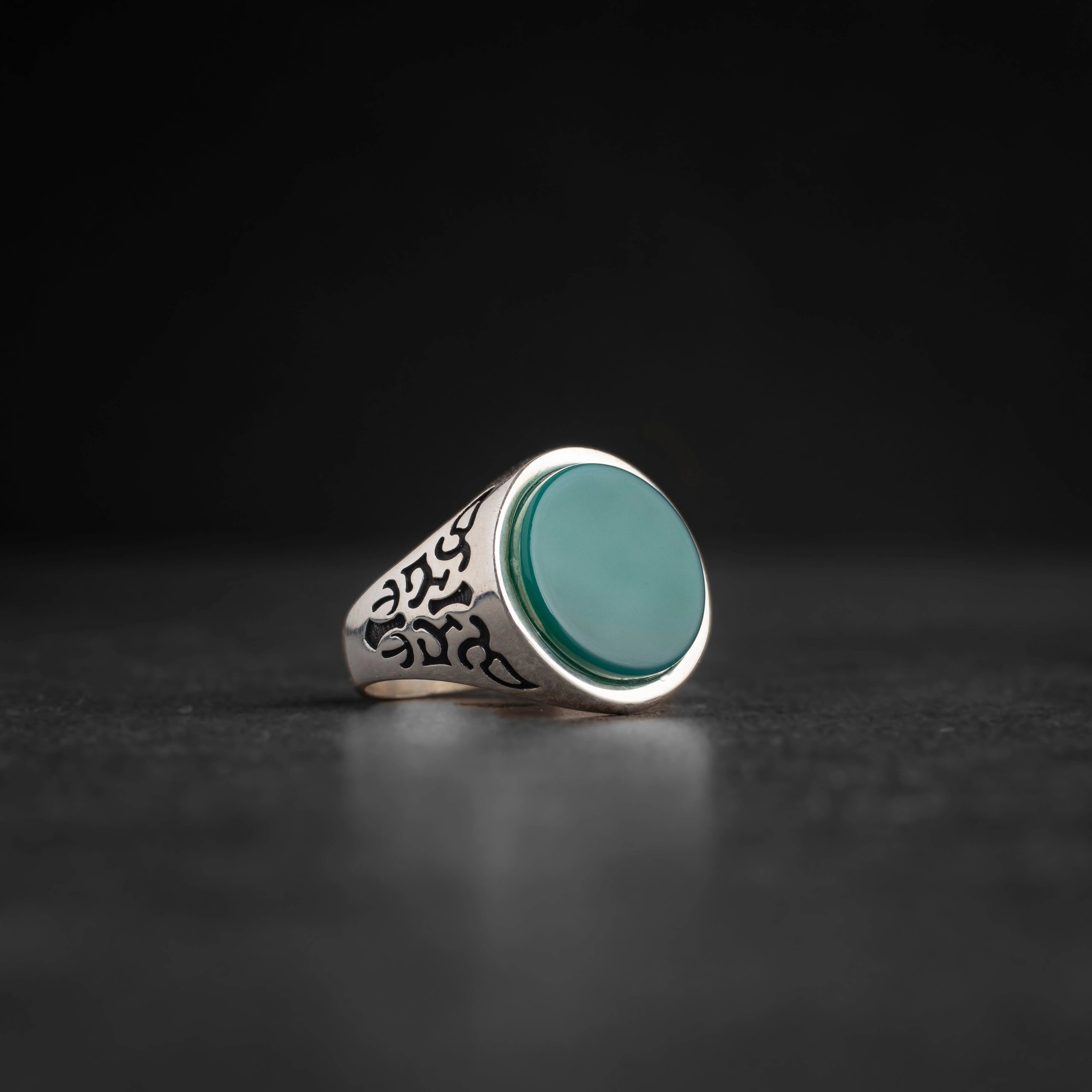 Men's silver ring decorated with green agate stone