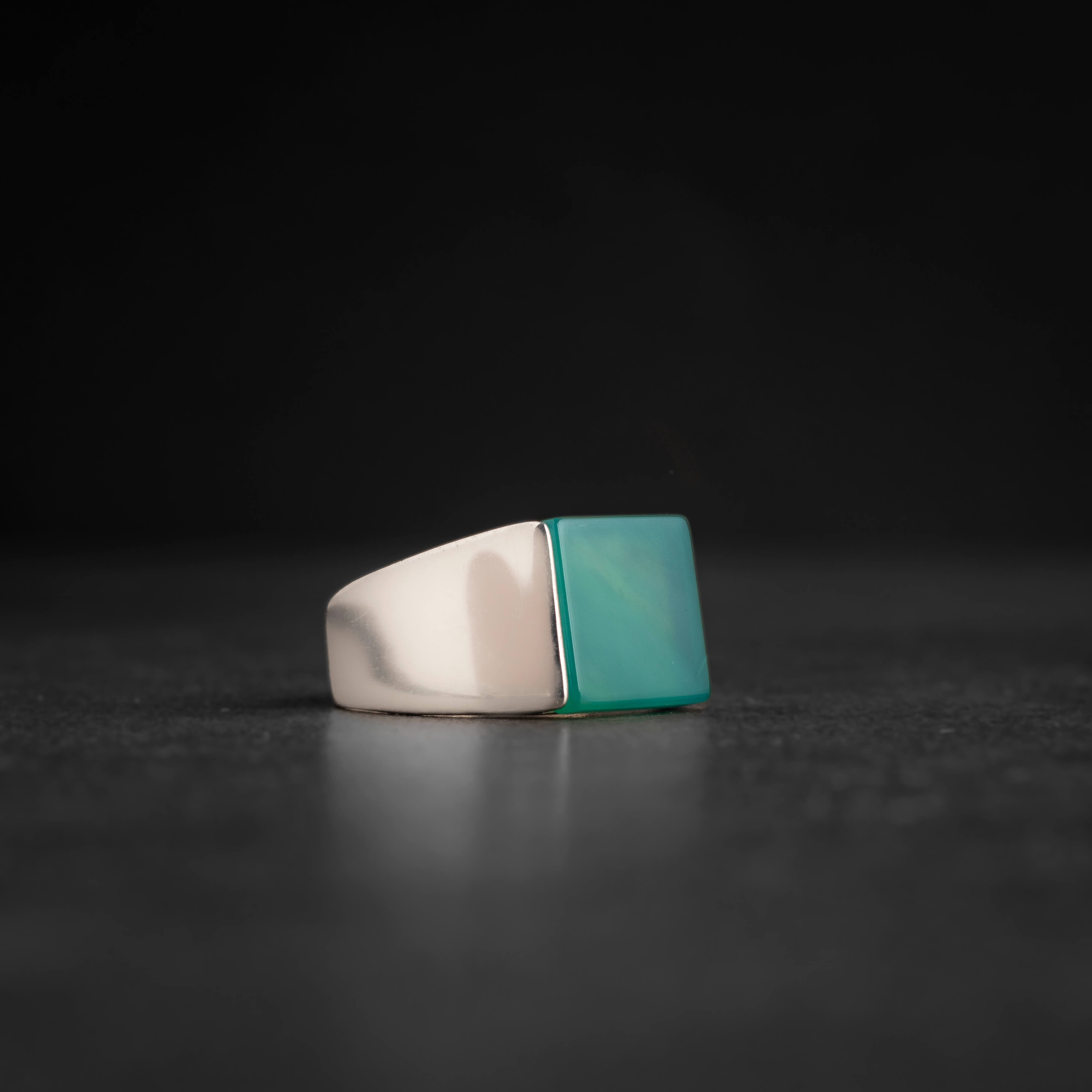 Men's silver ring decorated with green agate stone