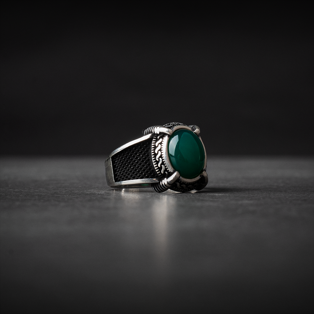 Men's silver ring decorated with green agate stone