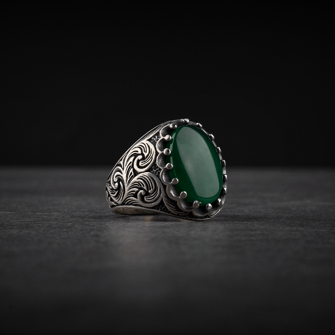 Men's silver ring decorated with green agate stone