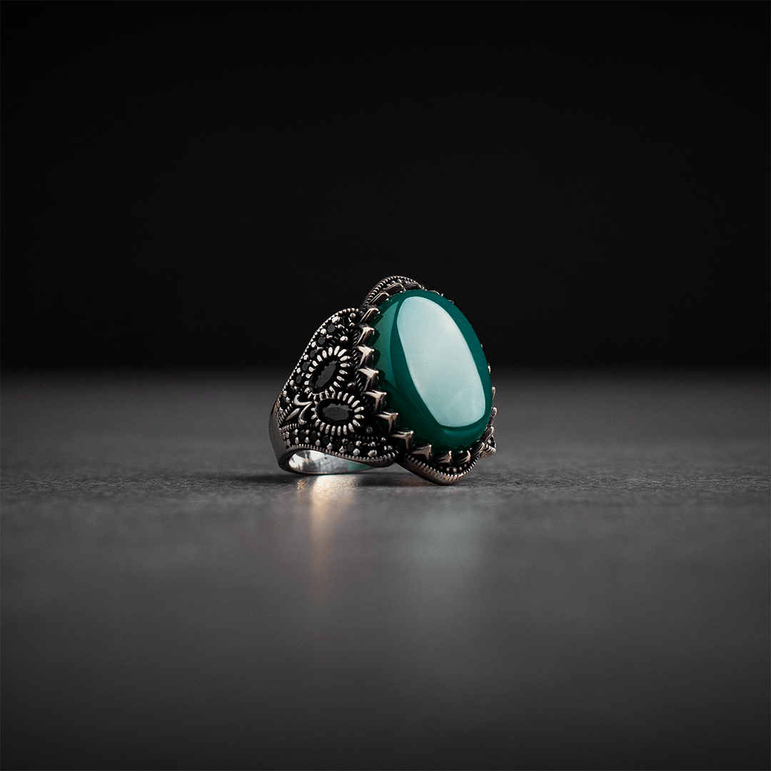 Men's silver ring decorated with green agate stone
