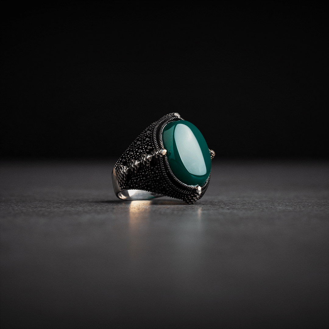 Men's silver ring decorated with green agate stone