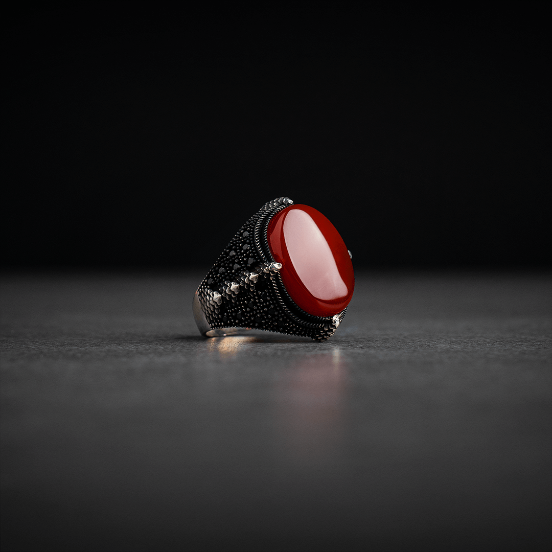 Men's silver ring decorated with red agate stone