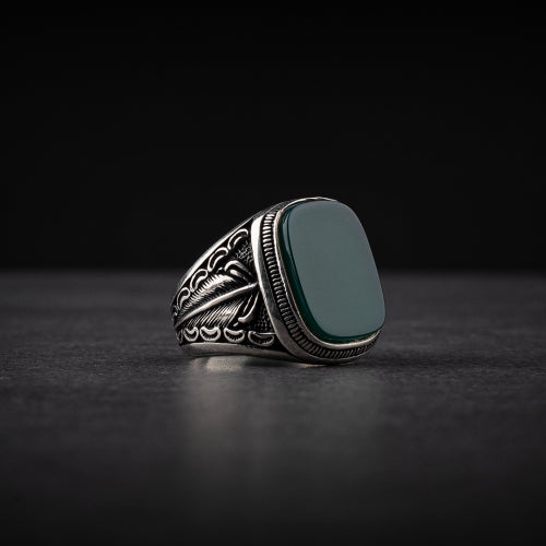 Men's silver ring decorated with green agate stone