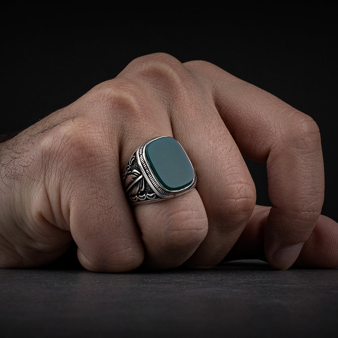 Men's silver ring decorated with green agate stone