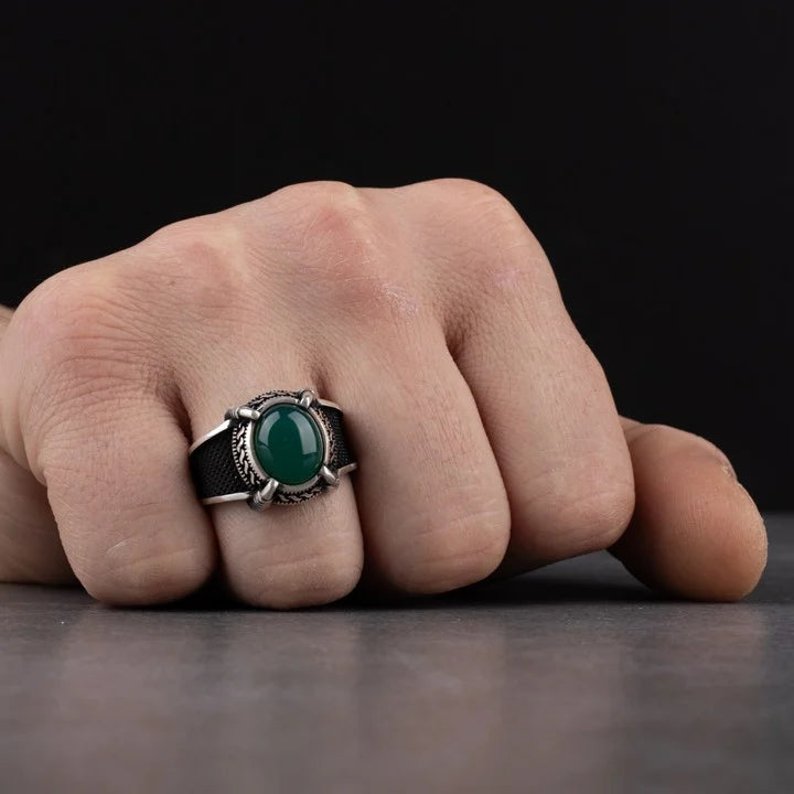 Men's silver ring decorated with green agate stone