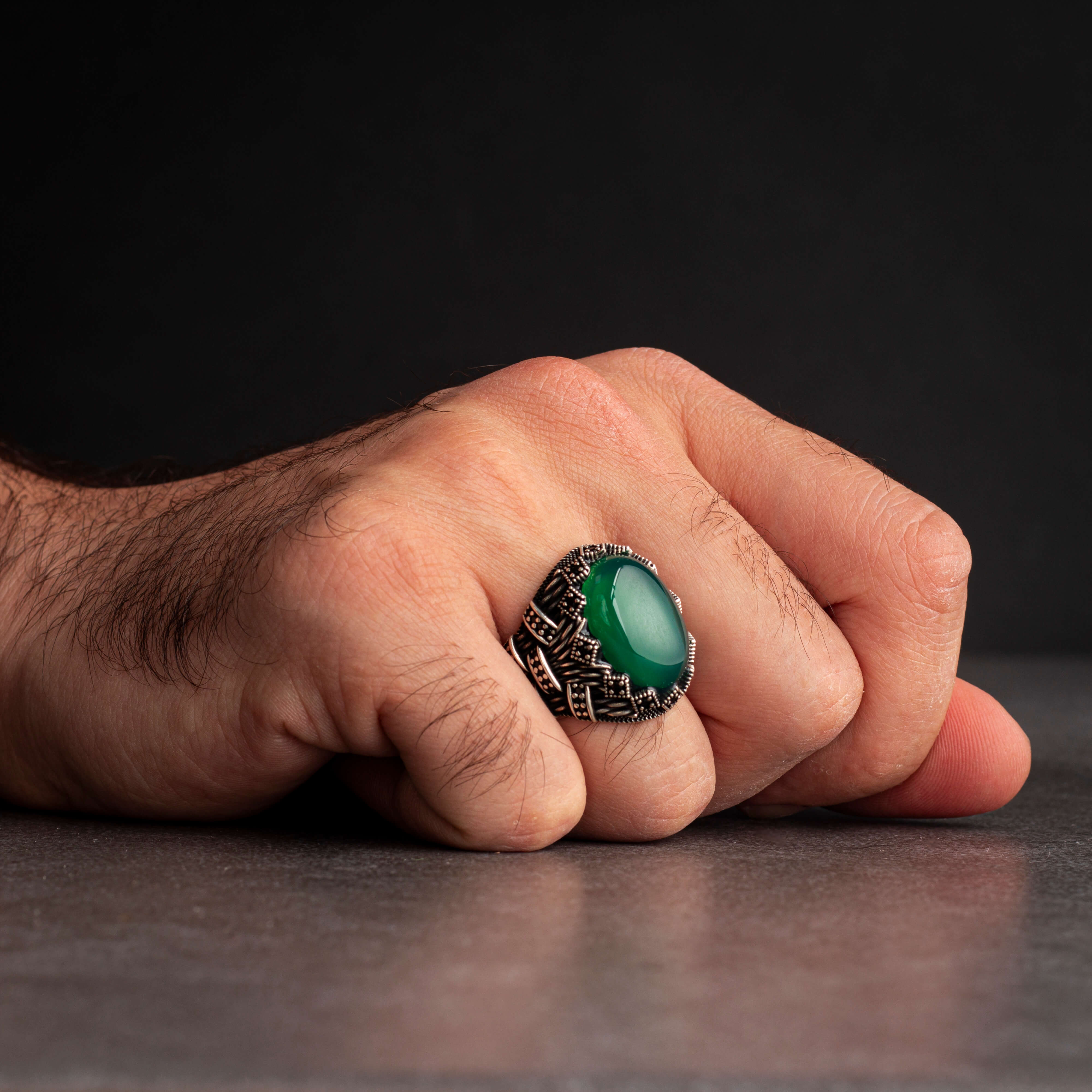 Men's silver ring decorated with green agate stone
