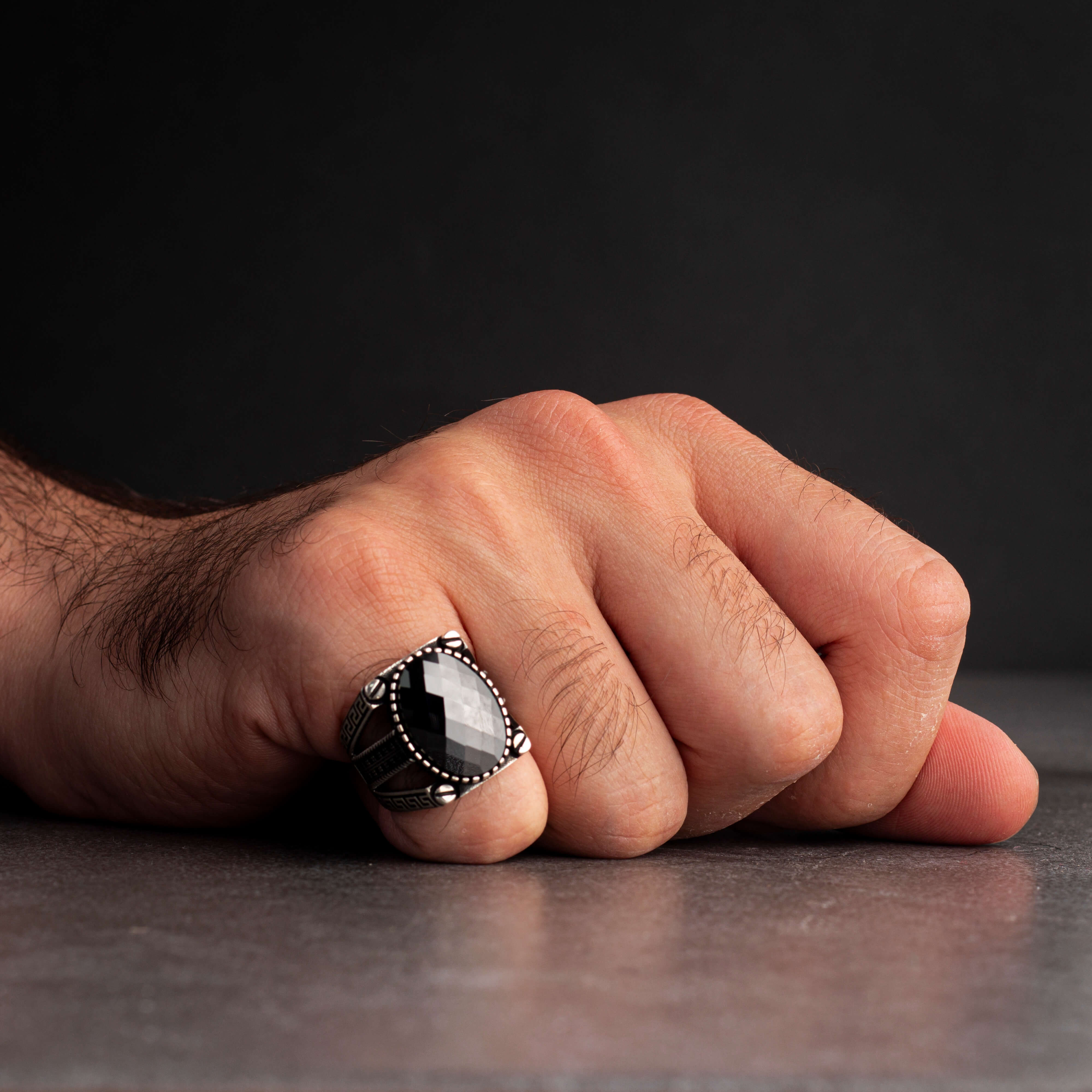 Men's silver ring decorated with black zircon stone