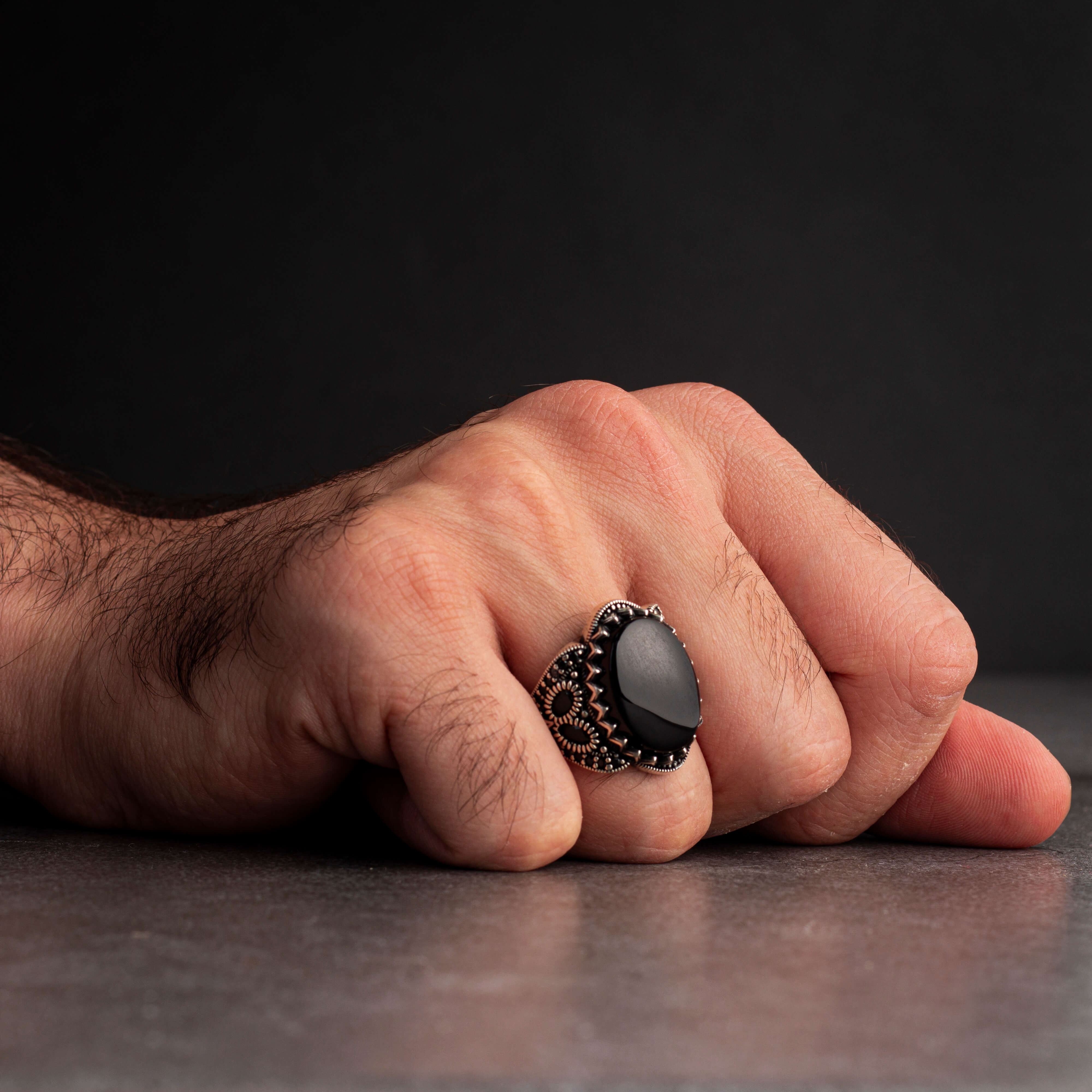 Men's silver ring decorated with black onyx stone