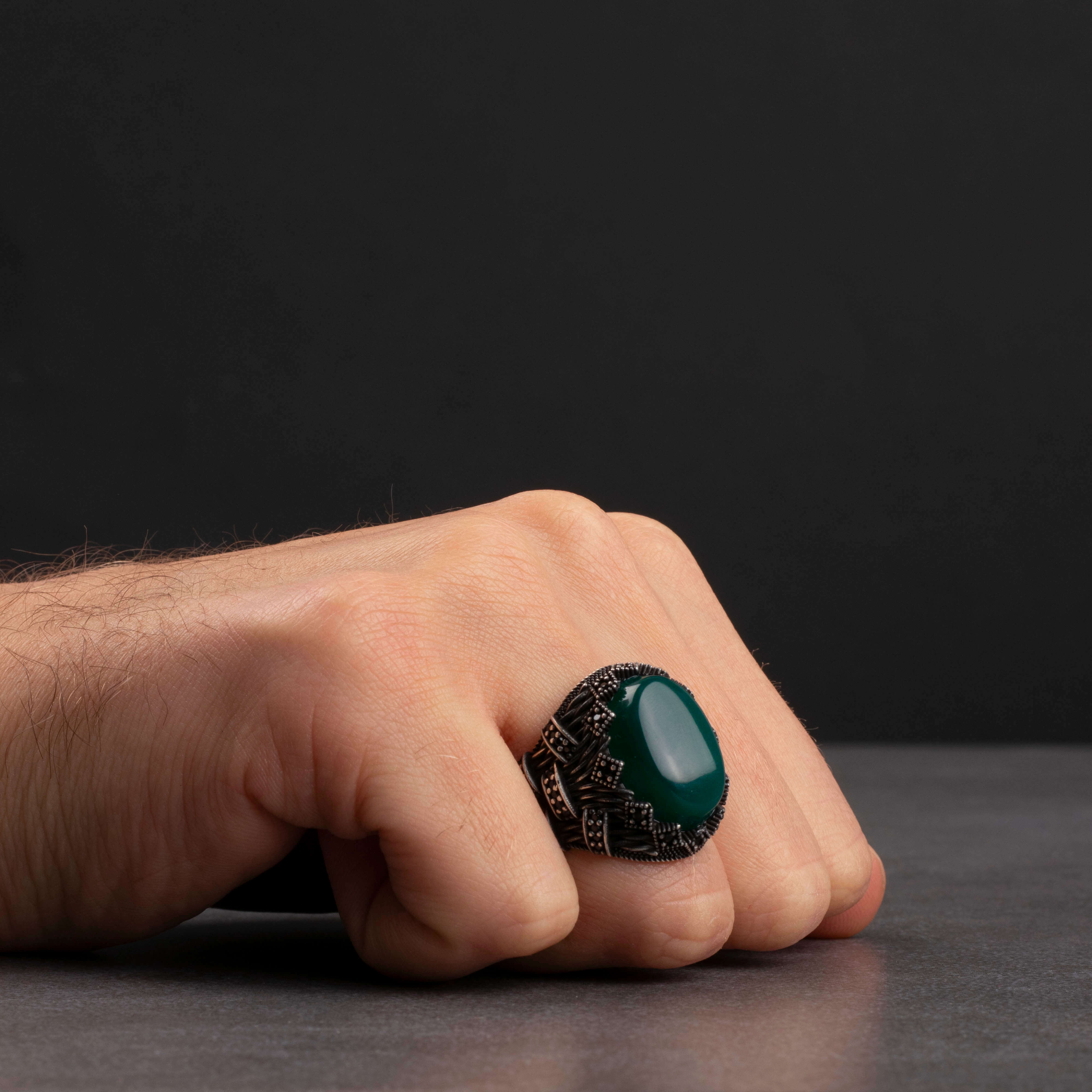 Men's silver ring decorated with green agate stone