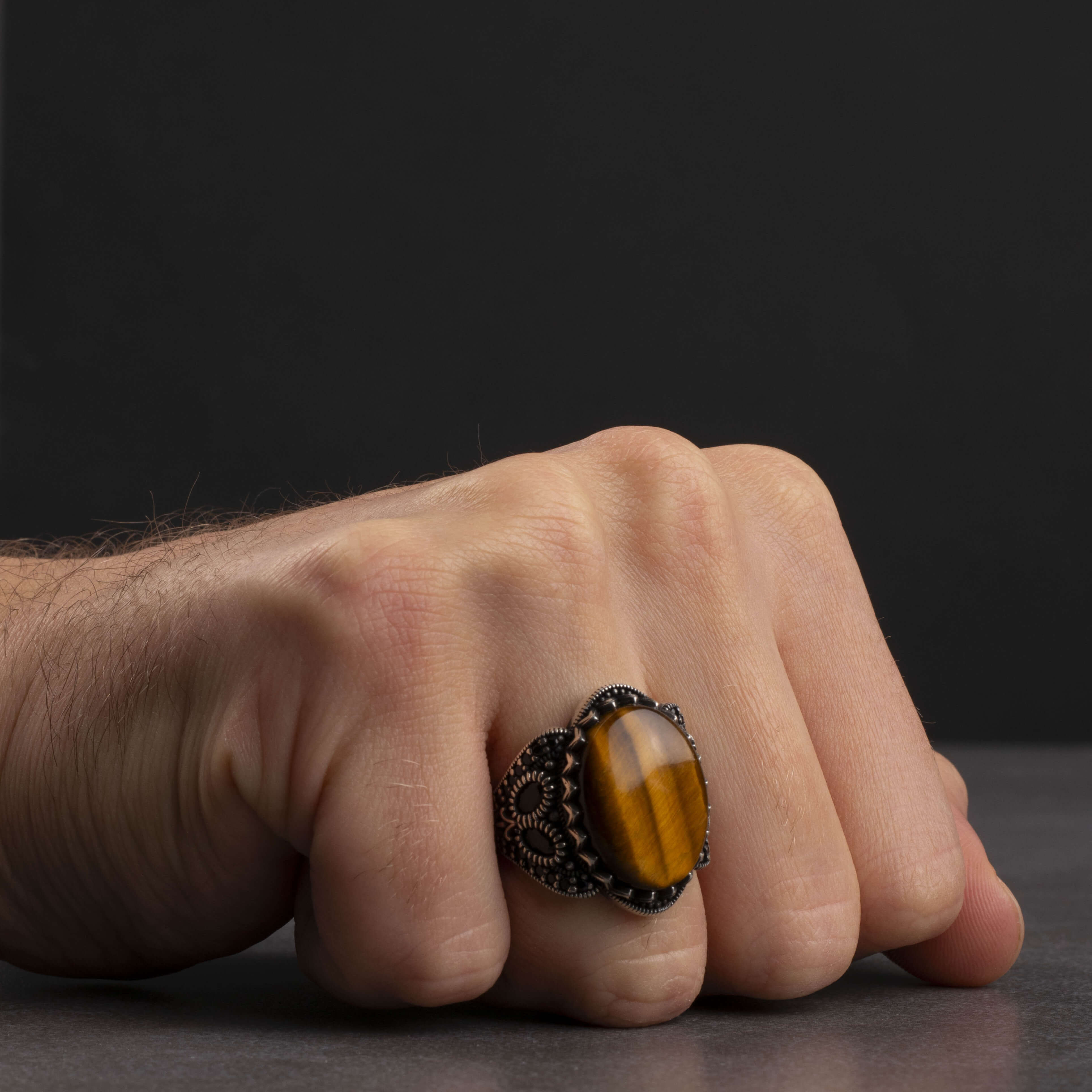 Men's silver ring with tiger eye stone with ornate design