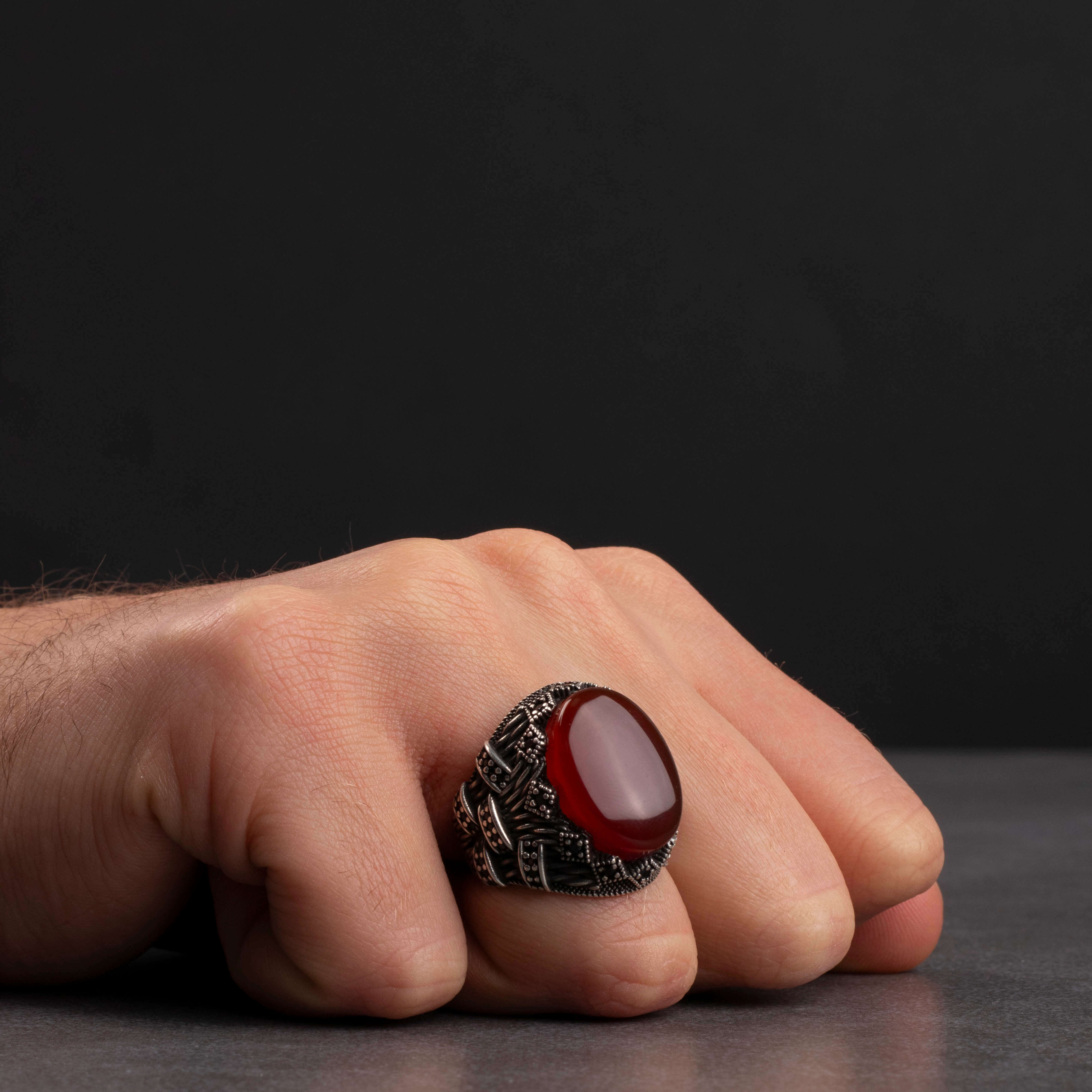 Men's silver ring decorated with red agate stone